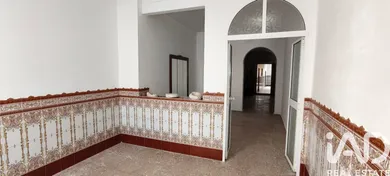 Maison de village à Lora del Río